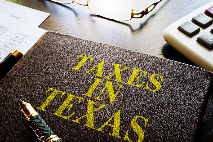 A book with a title, Taxes in Texas.