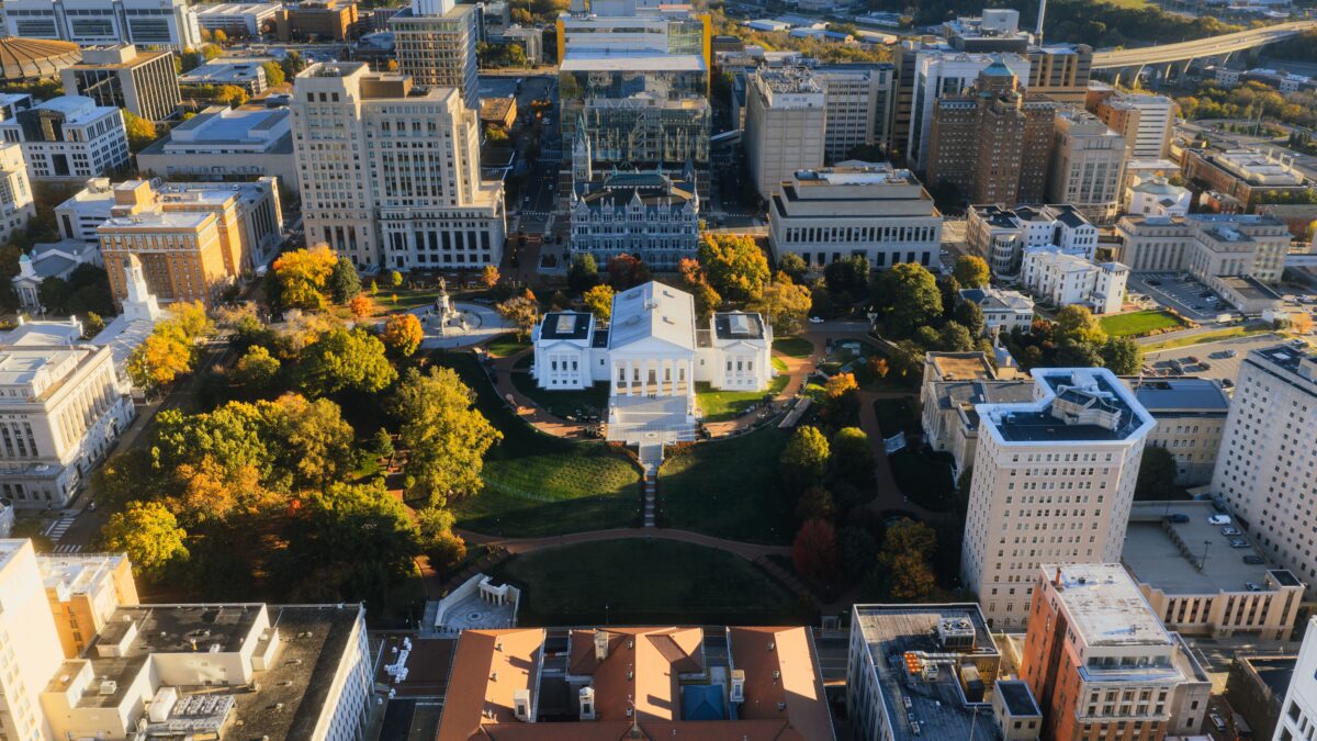 An overhead view of the of the State Capitol Building in Richmond, Virginia that also shows surrounding businesses.